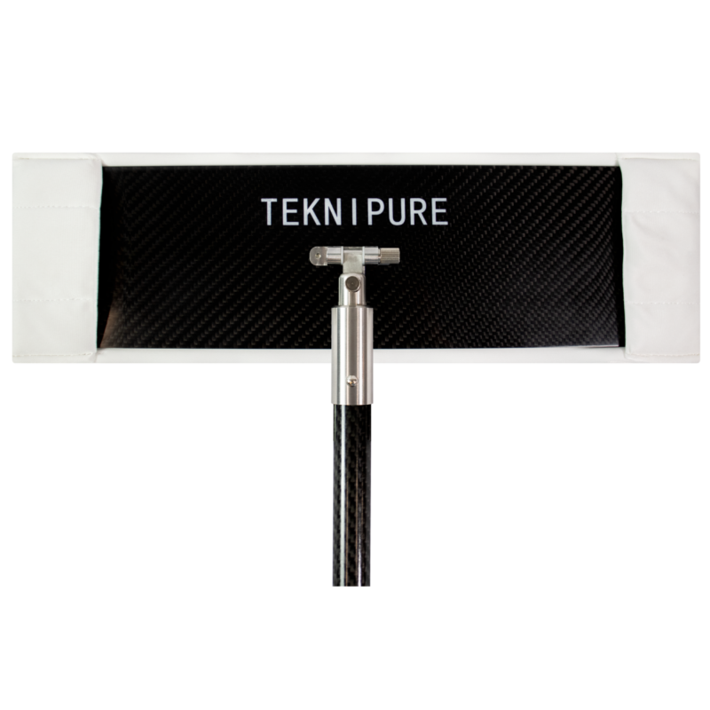 Tekni Pure lighting panel mounted on a stand with a carbon-fiber panel and white ends.