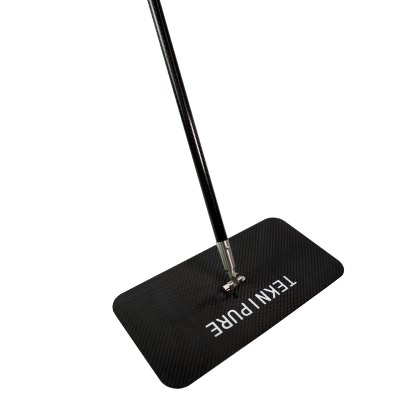 Close-up of a black textured rectangular microphone stand base with a metal connector and upright pole.